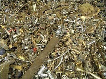 Pile of brass fittings and valves.