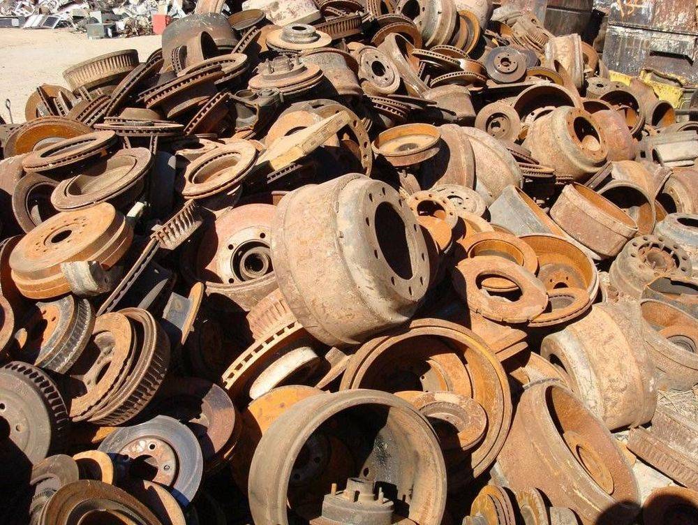 Rusty cast iron brake rotors and drums.