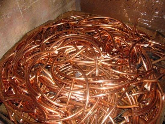 Bin of bright copper wire and tubing.