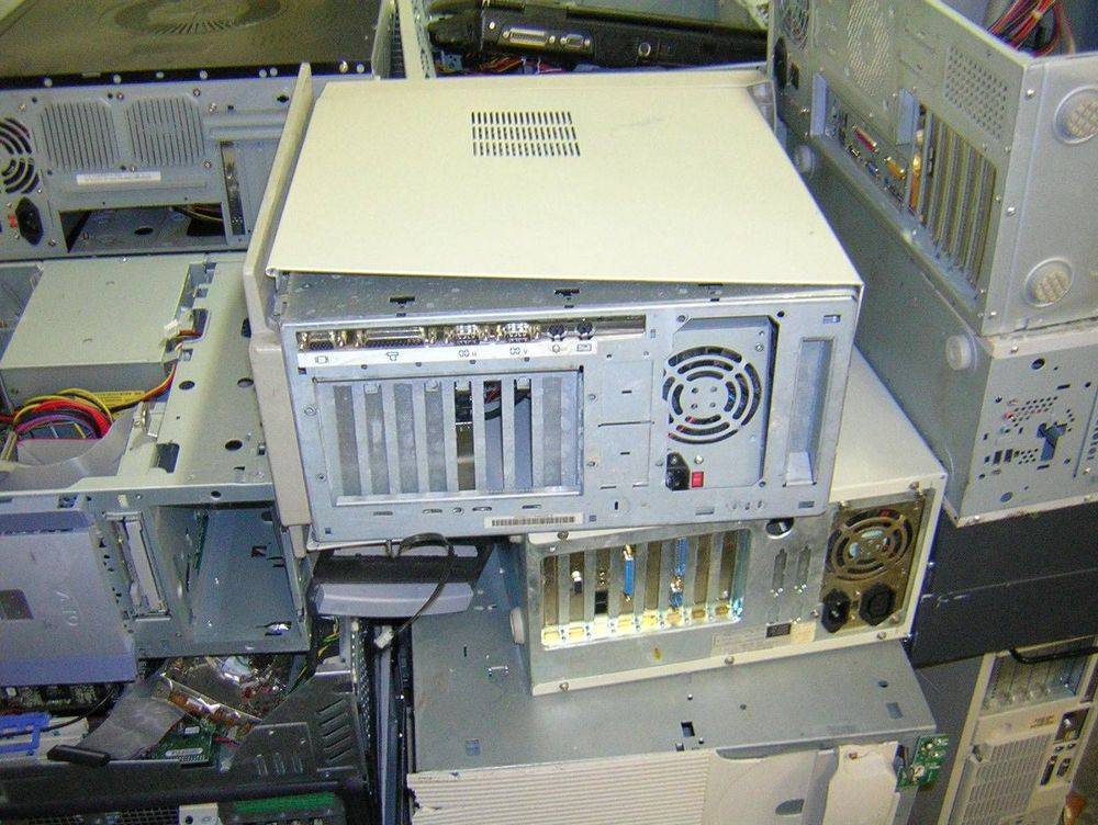 Stack of desktop computer towers.
